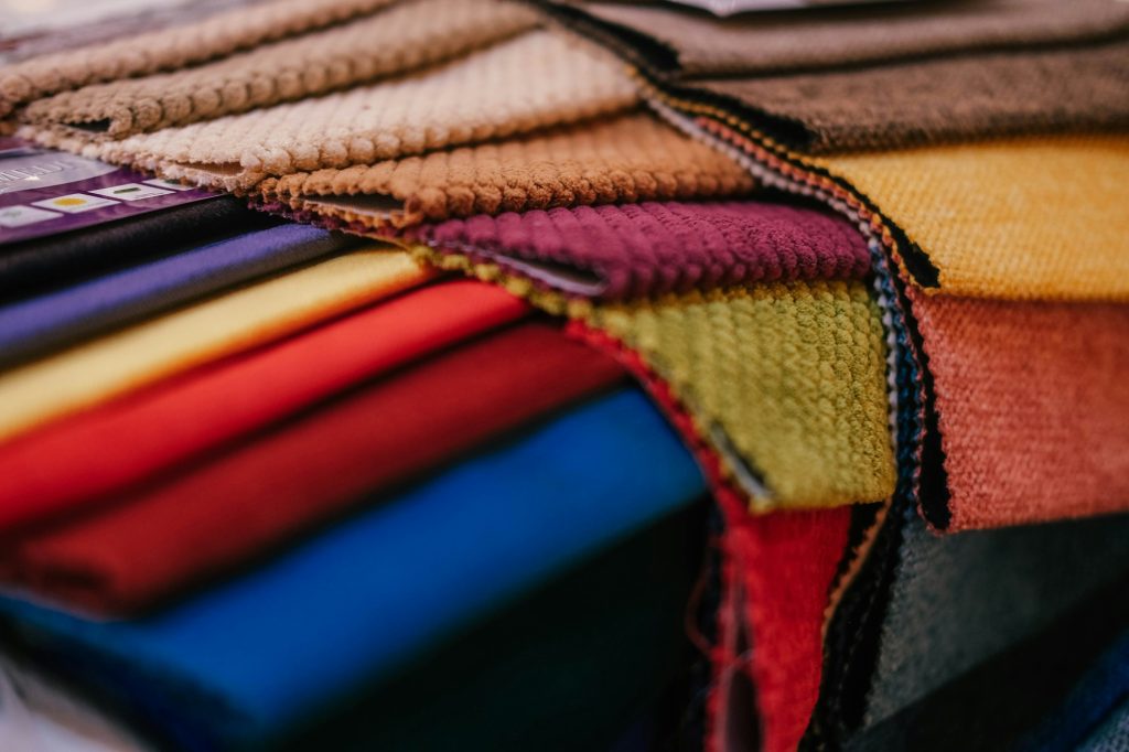 Colorful samples of upholstery fabrics for upholstered furniture.